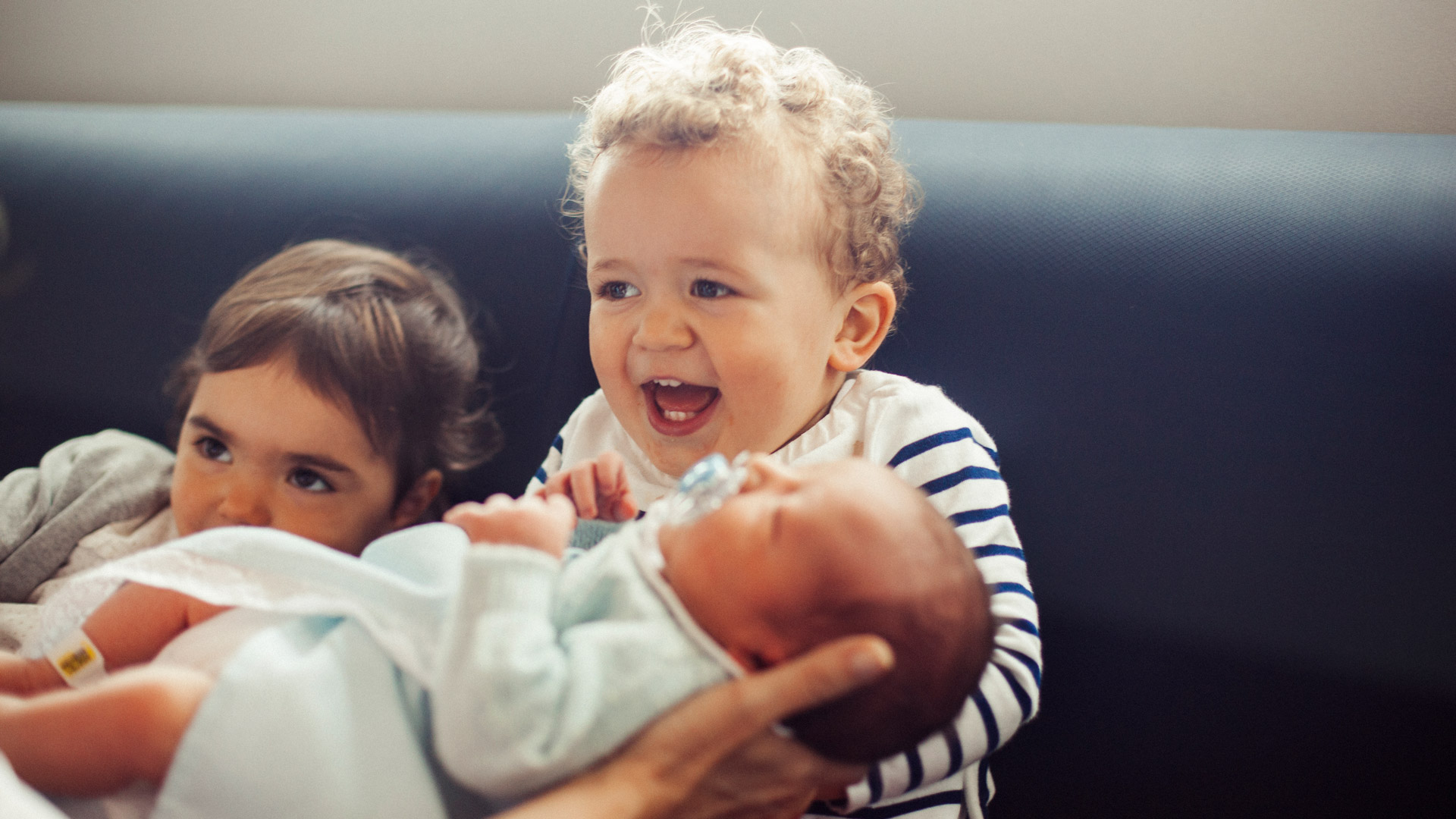 baby and siblings